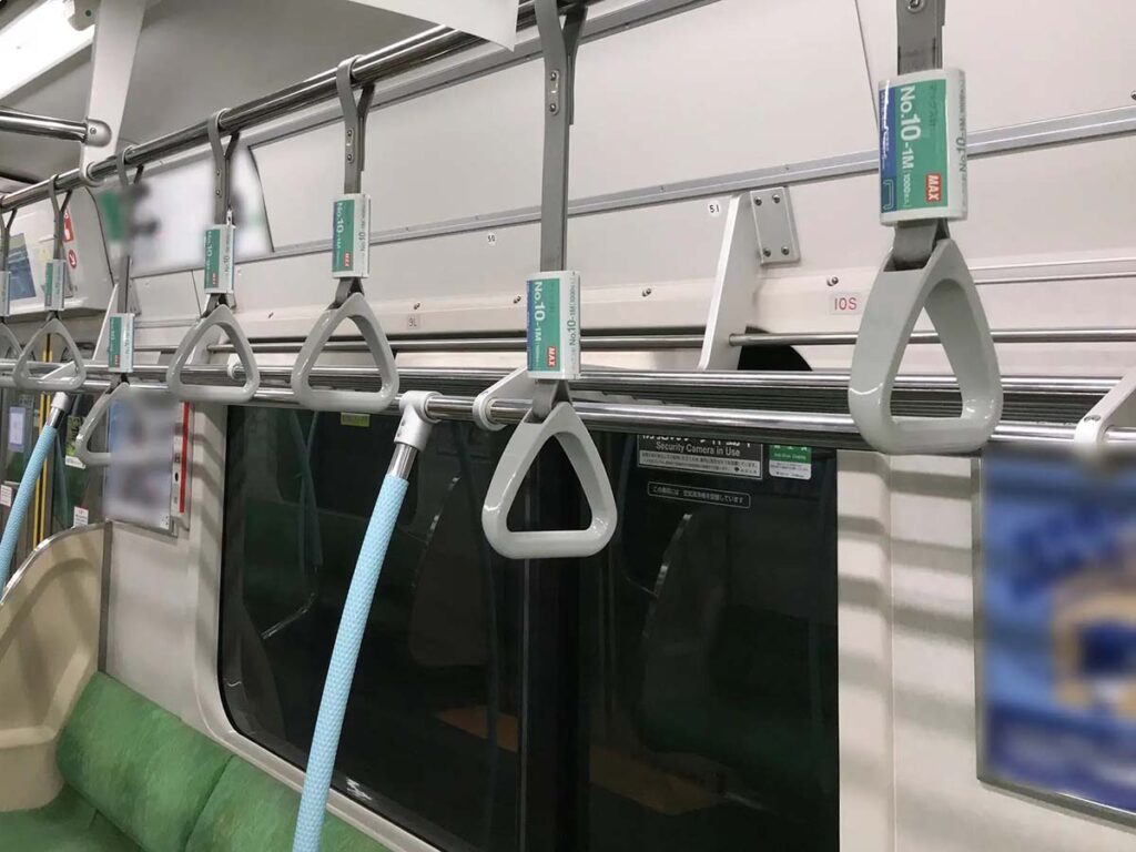 マックス、ホッチキス針箱モチーフの吊手広告